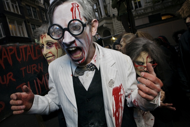 Amsterdam, Oct 31st 2008: the Banking Crisis of 2008 attracted dozens of zombies to the 'Apokaputalism now! Zombie Walk' through the shopping area to the Stock Exchange.